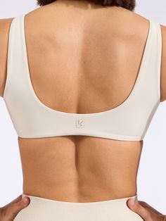 Features: Twist front detailing V-neckline Removable bust pads Details: Fabric: NuBre (Nylon/Spandex) Light Support Level The Twisted Sports Bra is a shortline sports bra with V-shaped neckline that’s sure to highlight all your best features. It is made with our signature NuBre fabric for a soft, second skin feel and high stretch retention. Jogger Shorts, Black Sports Bra, Short Shirts, Trending Gifts, Twist Front, Sports Leggings, Skirts For Sale, Second Skin, Wearing Black