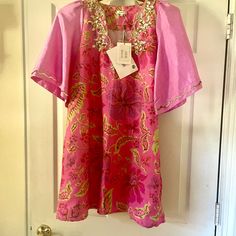 Gorgeous Vivid Pink Color, With Beautiful Sequin Detailing Around Neckline And On Sleeves. Size Is Euro 40 But It Fit Me And I Wear A Size 10. So I’d Say It’s Kind Of A Medium To Large Size Depending On How You Like Your Dresses To Fit. Summer Festive V-neck Tunic, Festive Short Sleeve Dresses For Vacation, Festive Short Sleeve Vacation Dresses, Fitted Tunic For Festive Summer, Fitted Short Sleeve Summer Kaftan, Fitted Short Sleeve Kaftan For Spring, Festive Silk Dress With Short Sleeves, Festive Short Sleeve Silk Dress, Pink Short Sleeve Kaftan For Spring