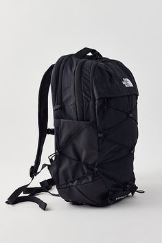 The North Face Borealis backpack is fitted with a FlexVent suspension system with a flexible yoke built from custom injection-molded shoulder straps, a padded mesh back panel and a breathable lumbar panel for an ultra-comfy feel at school, work or travel. Features The North Face Borealis backpack Lightweight backpack design Stand-up style 15" laptop sleeve Tons of flexible padding for comfort Padded mesh back panel Water bottle pocket Content + Care Recycled nylon ripstop with DWR finish Spot clean Imported Size 28L Dimensions: 13.25" l 9.75" w x 19.75" h | The North Face Borealis Backpack in Black, Women's at Urban Outfitters The North Face Black Backpack With Adjustable Strap, The North Face Sporty Standard Backpack, Sporty The North Face Standard Backpack, The North Face Nylon Backpack For School, The North Face Nylon School Backpack, The North Face Black Nylon Backpack, The North Face Black Hiking Backpack, Black Nylon Backpack By The North Face, Black The North Face Backpack For Hiking