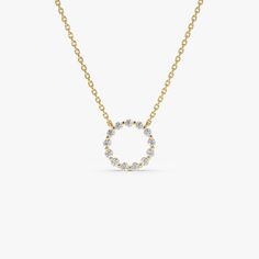 Discover the mesmerizing beauty of our 0.25 ctw Diamond Circle Necklace in 14K Gold. Symbolizing the eternal Circle of Life, this Dainty Round Diamond Pendant is a masterful blend of elegance and meaning. Perfect for layering or standing out on its own, this piece is a radiant addition to any diamond jewelry ensemble. ▶ Details   * Made to Order * Gold KT: 14K Solid Gold (also available in 18K upon request) * Diameter: 10MM * Round Diamond: 13 pcs 1.7MM * Total CTW: 0.25 ctw * Diamond Color-Clarity: G Color SI Clarity * Ready to Ship in 3-10 Business Days ▶ See more of our Diamond Necklaces here - https://etsy.me/3YbpVq2  ▶ See our storefront here - http://etsy.me/2lUcVnH  ▶ All store sections here * Diamond Rings - http://etsy.me/2lwKUl8  * Diamond Earrings - http://etsy.me/2lyqVBP  * Dia Diamond Circle Necklace, Round Diamond Pendant, Mesmerizing Beauty, Gold Armband, Diamond Necklaces, Circle Diamond, Ruby Jewelry, Circle Of Life, Circle Necklace