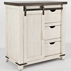 a white cabinet with three drawers and two doors