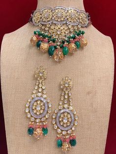 Premium quality Designer piece. American diamond lining . Uncut foil kundan, crystal beads, tumble beads . Glass quartz band work. widest part of the choker is about 2 inch. Beaded part sits in the neck in V shape. Comes with matching kundan earring . Oversize about 5.5 inch long . Light weight , push back . Bollywood Style Kundan Beaded Choker, Diwali Kundan Beaded Choker, Kundan Beaded Choker For Parties, Party Kundan Choker With Cutdana, Beaded Kundan Choker Necklace, Festival Beaded Kundan Choker Necklace, Festive Beaded Kundan Choker Necklace, Heavy Choker For Party And Festivals, Heavy Kundan Choker For Festivals