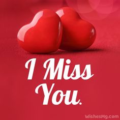 two red hearts sitting next to each other on a pink background with the words i miss you