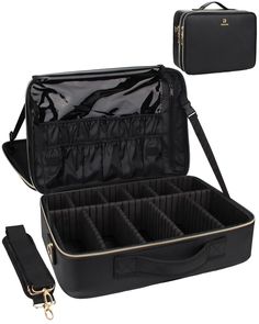 an open black suitcase with compartments and zippers on the inside, sitting next to it