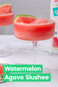 watermelon agave slushee is garnished with a slice of lime