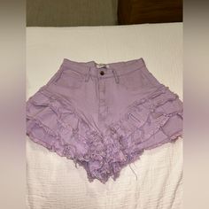 Never Worn Purple Jean Shorts Size Large Spring Ruffled Short Bottoms, High Rise Purple Bottoms With Pockets, High Waist Cotton Bottoms With Ruffles, Stretch Purple Bottoms For Summer, Summer Purple Bottoms With Pockets, Purple High Waist Shorts For Spring, Purple High Waisted Shorts For Spring, Chic High Waist Purple Bottoms, High Waist Purple Shorts For Spring