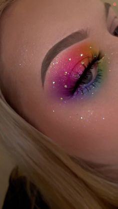 Rainbow Eyeshadow With Rhinestones, Festival Makeup Rainbow, Rainbow Glitter Eye Makeup, Colorful Makeup With Gems, Rave Make Up Looks, Halloween Gem Nails, Rainbow Freckles Makeup, Pride Face Gems, Rhinestone Eye Makeup Hooded Eyes