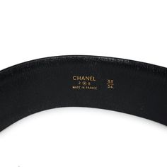 This vintage 90's Chanel iconic CC medallion chainlink lambskin leather belt is of black and gold lambskin leather with 24K gold plated hardware, features two draped gold-tone chains accented with a dangling 'CC' logo charm, and has a large black and gold chainlink square belt buckle.Origin: FranceCondition: Vintage; Excellent - The leather belt shows signs of wear with some peeling on the inside/lining of the belt, minor scratches and some press markings from the metal chains. The gold chains a Gold Belt With Logo Plaque For Formal Occasions, Classic Evening Belts With Gold-tone Hardware, Elegant Black Belt With Gold-tone Logo Plaque, Luxury Formal Chain Belt With Gold-tone Hardware, Elegant Gold Leather Chain Belt, Black Belts With Gold-tone Hardware For Evening, Luxury Black Chain Belt For Evening, Luxury Black Chain Belt, Luxury Evening Belts With Gold-tone Hardware