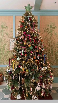 a decorated christmas tree with ornaments on it