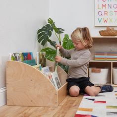 Book Displays let little ones see all of their favorite books on display in easy-to-reach shelves that make story time simple. The Toddler Book Display is perfect for displaying and storing extra tall books for little ones. Each display pocket stores progressively larger books; starting from the first pocket which is 7" deep, then 9.5", 11", and finally a back book pocket that is 13" deep for your tallest toddler books. Use this bookcase's low, forward-facing shelves keep all of your kid's favor Toddler Room Book Storage, Toddler Bookshelf Ideas, Toddler Reading Corner, Kids Book Storage Ideas, Kid Bookshelf, Nursery Book Storage, Book Crate, Kids Chapter Books, Book Display Stand