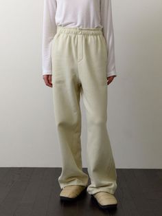 Composition : Cotton 100%Country of Origin : KOREA Beige Straight Sweatpants For Fall, Cream Pants With Pockets For Winter, Wide Leg Beige Sweatpants For Winter, Cream Wide Leg Pants For Winter, Winter Cream Pants With Pockets, Cream Relaxed Fit Bottoms For Winter, Cream Pants With Elastic Waistband For Winter, Winter Cream Pants With Elastic Waistband, Cream Wide Leg Winter Pants