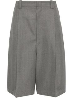 medium grey virgin wool pleat detailing pressed crease belt loops two diagonal pockets to the sides rear patch pocket knee-length concealed front button, hook and zip fastening Wool Shorts, Bell Ross, City Shorts, Versace Outfit, Tailored Shorts, Tom Dixon, Balenciaga Triple S, Dress Watch, Custom Watch