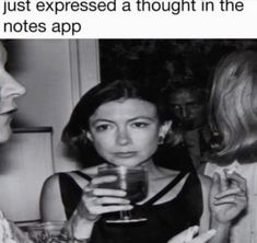 a woman holding a glass with another woman standing next to her and the caption reads, i just exposed a thought in the notes app