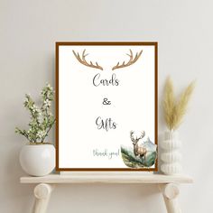 a card with deer antlers on it and the words cards & gifts above it