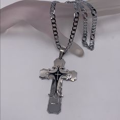 Stainless Steel Cross And Chain, Chain 24 Inches, Cross 3 1/2 Inches Long, Total Weight Chain And Cross 65 Grams Silver Cross Box Chain Necklace, Silver Cross Chain Necklace With Box Chain, Silver Box Chain Necklace With Cross Shape, Silver Box Chain Necklace With Cross Pendant, Silver Chain Necklace With Cross Pendant, Silver Cross Necklace With Curb Chain, Silver Cross Curb Chain Necklace, Silver Curb Chain Necklace With Cross Pendant, Silver Cross Chain Necklace With Curb Chain