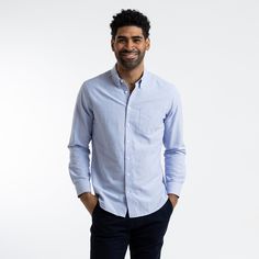 The Blue Oxford shirt is one of the most timeless and versatile pieces in the service industry, able to be dressed up with a blazer, or down with jeans and sneakers. The updated and upgraded version of our Service Oxford features an equally durable but much softer 75/25 cotton poly blend, as well as cleaner stitching, a crisper collar, and an improved fit. Features: Button-down collar, clean finished seams Material: 75% Cotton, 25% Polyester, 4oz Blue Oxford Cloth Fit: Model is 6'0"/170 lbs, wea Classic Washed Blue Shirt For Workwear, Blue Cotton Dress Shirt For Business Casual, Blue Cotton Dress Shirt With Relaxed Fit, Blue Relaxed Fit Dress Shirt For Spring, Light Blue Cotton Dress Shirt For Spring, Blue Relaxed Fit Dress Shirt For Business, Light Blue Casual Dress Shirt For Business Casual, Blue Relaxed Fit Dress Shirt For Work, Light Blue Casual Dress Shirt For Business