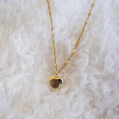 Tiny Gold Puffy Heart Necklace 14Kt Gold Plated Small Heart Necklace for Woman Minimalist Necklace Friendship Necklace Bridesmaids Gifts This lovely necklace features a tiny and adorable puffy heart charm, Looks beautiful layered with other necklaces. Puffy heart is 14kt gold plated. Measures 13mm. Beautiful ultra sparkly twisted gold chain. Lobster clasp at the end. Dainty 14k Gold Filled Heart Necklace, 14k Gold Filled Heart Necklace For Anniversary, 14k Gold Filled Heart Pendant Necklace For Anniversary, Dainty Rose Gold Plated Heart Necklace, Dainty Gold Plated Heart Necklace For Wedding, Dainty Rose Gold Tarnish Resistant Heart Necklace, Dainty Gold-plated Heart Necklace For Weddings, Valentine's Day 14k Gold Filled Heart Pendant Necklace, 14k Gold-filled Heart Pendant Necklace For Anniversary