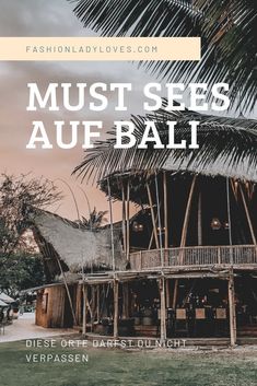 a wooden house with palm trees in the background and text overlay that reads must sees