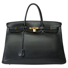 Beautiful​ ​Hermes​ ​Birkin​ ​40​ ​in​ ​Togo​ ​black​ ​leather,​ ​gold​ ​plated​ ​metal​ ​trim,​ ​double​ ​handle​ ​in​ ​black​ ​leather​ ​allowing​ ​a​ ​hand​ ​carry Flap​ ​closure Black​ ​leather​ ​inner​ ​lining,​ ​one​ ​zippered​ ​pocket,​ ​one​ ​patch​ ​pocket Signature:​ ​"Hermès​ ​Paris​ ​Made​ ​in​ ​France" Year:​ ​K​ ​square​ ​(2007) Dimensions:​ ​40x30x20​ ​cm​ ​(15,7x12,6x7,9​ ​Inches) Reference:​ ​101822 General​ ​condition:​ ​7/10 Sold​ ​with​ ​tirette,​ ​clochette,​ ​padlock​ ​and​ Hermes Birkin 40, Hermes Paris, Prada Crossbody, Made In France, Prada Crossbody Bag, Chanel Handbags, Hermes Birkin, Fashion Handbags, Backpack Bags