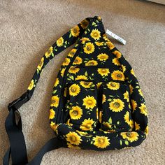 - Black/Yellow/Green - Sunflowers - New With Tag - 3 Zipper Pockets On The Front - 1 Zipper Pocket Inside - Adjustable Strap - See Pics For Measurements Yellow Shoulder Bag For Back To School Travel, Back To School Yellow Shoulder Bag With Adjustable Strap, Yellow Summer Backpack For Everyday Use, Yellow Backpack For Everyday Summer Use, Casual Yellow Bag For Back To School, Yellow Casual Back To School Bag, Casual Yellow Back To School Bag, Yellow Summer Travel Backpack, Yellow Backpack For School In Summer