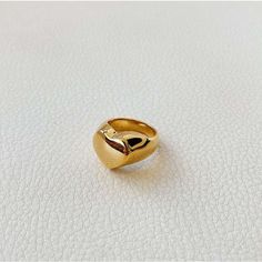 This gold heart signet ring is made from stainless steel plated in 18 karat gold. It is a unique statement piece yet simple enough to suit both casual and formal wear. This ring will add a chic and morden touch to your outfit and perfect for everyday wear.………………………………….D E T A I L S• Materials: Stainless steel, 18k gold plating.• Available Size: US 6 (Diameter: 16.5mm), US 7 (Diameter: 17.3mm), US8 (Diameter: 18.2mm)• This product is hypoallergenic, water and tarnish resistant. Everyday Open Ring In Gold, Modern Heart-shaped Ring For Everyday Wear, Modern Everyday Heart Ring, Classic Gold Heart Ring For Everyday, Trendy Gold Heart Ring For Anniversary, Modern Heart Shaped Ring, Gold Open Heart Ring Modern Style, Trendy Gold Heart Promise Ring, Modern Everyday Heart-shaped Ring