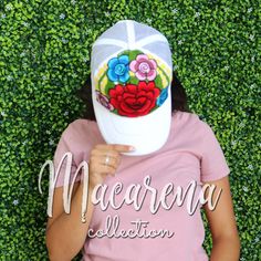 This women's hat is hand embroidered in Mexico. It is a vintage style baseball cap with an adjustable strap in the back. The front is covered in colorful flowers. Each embroidered flower is a bit unique. The hat has a mesh back, making it breathable and comfortable in the warm weather. About Our Items: Each one of our items is handmade/hand woven by Indigenous communities of Chiapas and Oaxaca in Mexico. Great care has been taken to ensure the quality and uniqueness of each item we sell. Our ite White Embroidered Trucker Hat, White Brimmed Trucker Hat, Embroidered Multicolor Cap, Custom Embroidered White Hat, White Custom Embroidered Hat, Multicolor Embroidered Cap, Embroidered Festival Cap, Embroidered Trucker Hat With Curved Brim, White Embroidered Trucker Hat With Curved Brim