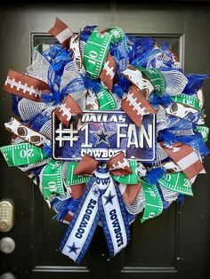 a football wreath with the number one fan on it