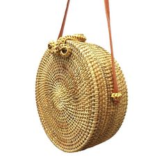 Item Type:HandbagsLining Material:PolyesterGender:WomenInterior:No PocketHandbags Type:Messenger BagsNumber of Handles/Straps:SingleShape:CircularMain Material:StrawHardness:HardClosure Type:HaspOccasion:VersatileDecoration:Hollow Out,BowStyle:NationalModel Number:Straw BagPattern Type:Solid Size: :20 X 20 X 7.5cm / 7.87 X 7.87 X 2.95" Casual Satchel Bag With Long Strap, Casual Summer Shoulder Bag With Long Strap, Summer Handheld Satchel With Adjustable Strap, Summer Bags With Long Strap For Daily Use, Summer Brown Shoulder Bag With Adjustable Handle, Brown Shoulder Bag With Adjustable Handle For Summer, Summer Satchel With Adjustable Handle, Casual Crossbody Bag With Strap, Casual Summer Bag With Long Strap