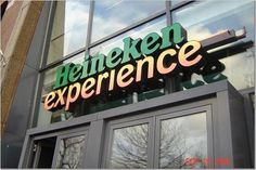 the sign on the front of a building that says heineken experience in german