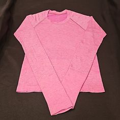 Rare Lululemon Women's Swiftly Tech Long-Sleeve T-Shirt, Size 4. Good Condition, But Slight Staining By The Thumb Holes. Pink Long Sleeve Tops With Thumbholes, Pink Go-dry Crew Neck Top, Pink Crew Neck Top With Go-dry Technology, Pink Workout Tops With Thumbholes, Heather Stretch Long Sleeve Top, Heather Long Sleeve Stretch Top, Casual Pink Tops With Thumbholes, Pink Long Sleeve Activewear For Light Exercise, Pink Long Sleeve Activewear For Workout