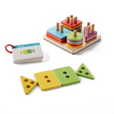 a wooden toy with matching blocks and pegs next to it's matching game