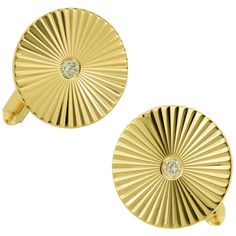 Classic cufflinks for the sharp dressed man! Crafted in 14 karat yellow gold in fluted fashion & timeless round shape, these staples are topped off with one diamond. Sturdy cufflink components for optimal placement on your cuff. 14KYG Diamond= 0.22 Cttw G VS 18.95mm Luxury Yellow Gold Round Cufflinks, Timeless Jewelry With Fluted Bezel For Formal Occasions, Timeless Formal Jewelry With Fluted Bezel, Luxury Formal Jewelry With Fluted Bezel, Formal Jewelry With Fluted Bezel, Classic Diamond Cufflinks With Polished Finish, Classic Diamond Cufflinks For Anniversary, Formal Diamond Cufflinks With Polished Finish, Diamond Cufflinks With Polished Finish For Formal Events