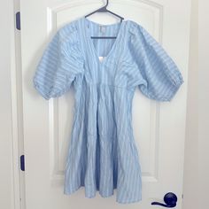 68% Cotton / 31% Rayon / 1% Spandex Comfortable, Light Blue Striped Summer Dress With Puffy Sleeves Just Pulls On (No Zipper) Two Pockets At Hips Smoke And Pet Free Home Casual Blue Mini Dress For Daywear, Casual Light Blue Mini Dress For Daywear, Blue Mini Dress With Short Sleeves For Daytime, Blue Short Sleeve Mini Dress For Daytime, Blue Mini Dress For Daywear In Spring, Casual V-neck Mini Dress For Daytime, Blue Mini Dress For Spring Daywear, Light Blue Mini Dress For Spring Daywear, Blue Cotton Mini Dress For Daytime