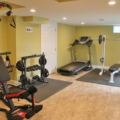 a home gym with treadmills and exercise equipment