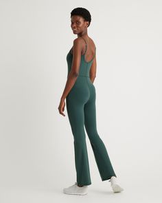 Update your activewear rotation with our Ultra-Form Kick Flare Jumpsuit. Designed for supreme comfort and versatility, this jumpsuit is perfect for low-impact workouts like yoga or just your day-to-day. The quick-drying, moisture-wicking, and anti-microbial properties keep you feeling comfortable. More things you'll love: the 4-way stretch, the adjustable spaghetti straps, a must-have flare leg, and an internal shelf bra with removable pads for support and coverage  | Quince | Women's Ultra-Form Flare Jumpsuit, Kick Flares, Low Impact Workout, Shelf Bra, Quince, Forest Green, Moisture Wicking, Must Haves, Spaghetti Strap