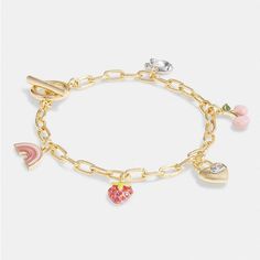 Style Number Ci890 Measurements Length: 7.5" Materials Plated Brass, Enamel, Glass And Cubic Zirconia Features Toggle Closure Valentine's Day Multicolor Charm Bracelet, Pink Adjustable Chain Charm Bracelet, Pink Metal Charm Bracelet With Adjustable Chain, Coach Heart Charm Jewelry, Coach Heart Charm Heart Jewelry, Trendy Pink Heart Bracelet With Heart Charm, Coach Elegant Heart-shaped Jewelry, Coach Elegant Heart Jewelry, Elegant Coach Heart-shaped Jewelry