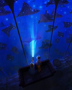 two children sitting on a bench looking at stingfish in an aquarium with blue lights