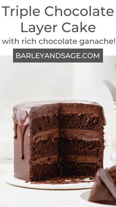 a triple chocolate layer cake with rich chocolate ganache on the top and bottom half