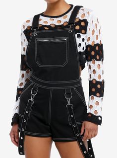 Bring those baddie vibes into summer with these black shortalls! Featuring a zipper pocket on the bib and white contrast stitch detailing throughout. Comes with removable grommet strap suspenders  plus hip and back pockets.Please note: Style is fitted with no stretch; size up for a looser fit.100% cottonWash cold; dry flatInseam: 11''ImportedListed in junior sizesModel is 5'9''Model wears size Small Black Cotton Shortalls For Summer, Trendy Black Shortalls For Summer, Black Overalls With Suspenders, Black Cotton Shortalls With Pockets, Black Summer Overalls With Adjustable Straps, Black Overalls With Adjustable Straps For Summer, Black Cotton Jumpsuits And Rompers With Adjustable Straps, Black Cotton Overalls With Suspenders, Black Utility Overalls For Summer