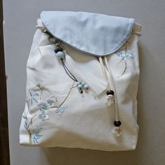 Embroidered Canavas Bag, Brand New. Elegant Color Combination. Blue Embroidered Bag For Daily Use, Casual White Embroidered Canvas Bag, Casual Blue Embroidered Shoulder Bag, Blue Embroidered Canvas Bag For Daily Use, White Cotton Bag With Floral Embroidery, Daily Use Embroidered Blue Canvas Bag, White Cotton Bags With Floral Embroidery, Casual Blue Embroidered Bag, Casual Floral Embroidered Backpack