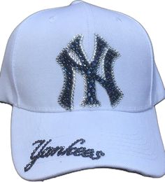 the new york yankees baseball cap with sequins is shown in white and blue