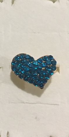 Crystal Rhinestone rings are no specific size ! They do adjust and are great for going out or to just wear anytime! They are inexpensive and make a statement ! Please feel free to ask any questions as I do not accept returns! Thank You for stopping by Cheap Heart-shaped Party Rings, Trendy Heart Shaped Rhinestone Jewelry, Adjustable Heart Crystal Ring For Gift, Blue Adjustable Heart Ring, Adjustable Blue Heart Ring, Adjustable Heart-shaped Crystal Ring Gift, Heart-shaped Rhinestone Evening Jewelry, Glamorous Heart-shaped Rhinestone Jewelry, Rhinestone Rings