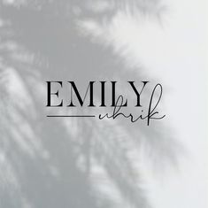 the word family written in black ink on a white background with palm tree leaves behind it