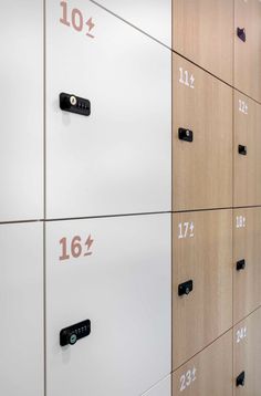 several lockers with numbers on them are lined up