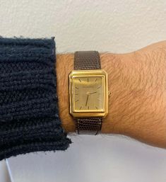 For Sale on 1stDibs - Classy and elegant Tiffany & Co. signed vintage wristwatch. This 18k solid gold and leather strap is for those in search of a classic and sleek timepiece. Formal Yellow Gold Watch Accessories With Rectangular Dial, Classic Gold Watch With Rectangular Dial, Luxury Gold Watch Bands For Business, Yellow Gold Business Watch With Rectangular Shape, Yellow Gold Business Watches With Rectangular Shape, Classic Yellow Gold Watch Bands With Rectangular Dial, Formal Gold Leather Watch Band, Designer Gold Watches With Leather Strap, Designer Gold Watch Bands For Formal Occasions