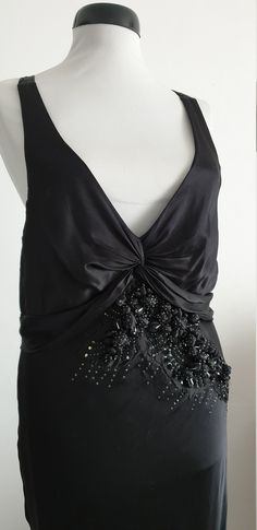 "Amazing Robert Cavalli black silk full -length dress with deep v neckline and open back , unique dimensional flowers with small beads ,bias construction, side zipper and tie back closures. ✂-----Measurements : fits like: medium bust : 40\" waist: up to 38\" hip: up to 44\" length: 59 1/2\" brand/maker: Robert Cavalli condition: excellent Shipping Is Avaliable Worldwide. Every item is carefully shipped Priority via Air Mail - shipping takes from 7 to 14 working days, depending on your location. Silk V-neck Evening Dress For Night Out, Fitted V-neck Silk Party Dress, Silk V-neck Gala Dress, Silk V-neck Dress For Party, Black Silk Evening Dress With Back Opening, V-neck Bias Cut Party Dress, Silk Floor-length Party Dress, Embellished Silk V-neck Maxi Dress, Cocktail Evening Dress With Bias Cut And V-neck