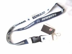 two lanyards that are on top of a white surface with black and white stars