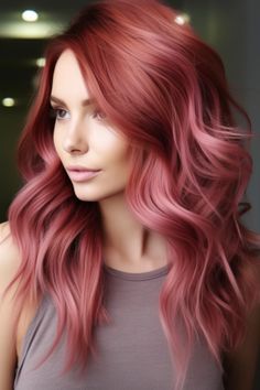 Introduce a cool, vibrant touch to your locks with a cool cranberry contrast. The cool-toned red color on top transitions beautifully into a softer pink, offering a unique, eye-catching look. Click here to check out more balayage hair colors for fall to upgrade your look. Fun Auburn Hair Color Ideas, Rose Gold And Red Hair, Pink Burgundy Hair, Unique Red Hair Color Ideas, Pink Hair Color Ideas For Short Hair, Cranberry Hair Color, Red Hair With Pink Highlights