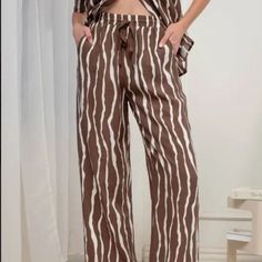 Super Stylish Zebra Print Mocha Wide Leg Pants! Brown Relaxed Fit Bottoms For Vacation, Relaxed Fit Brown Bottoms For Vacation, Brown Cotton Vacation Pants, Brown Wide Leg Pants For Beach In Spring, Brown Cotton Pants For Vacation, Spring Beach Brown Wide Leg Pants, Brown Pants With Pockets For Vacation, Brown Vacation Trousers, Brown Cotton Pants For Day Out