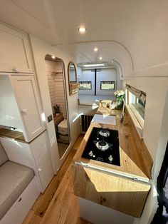 the kitchen is clean and ready to be used as a living area in an rv